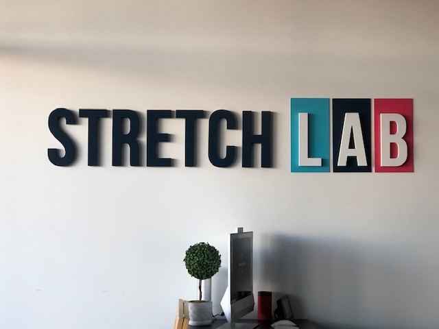 Stretch Lab San Tan reseption logo sign